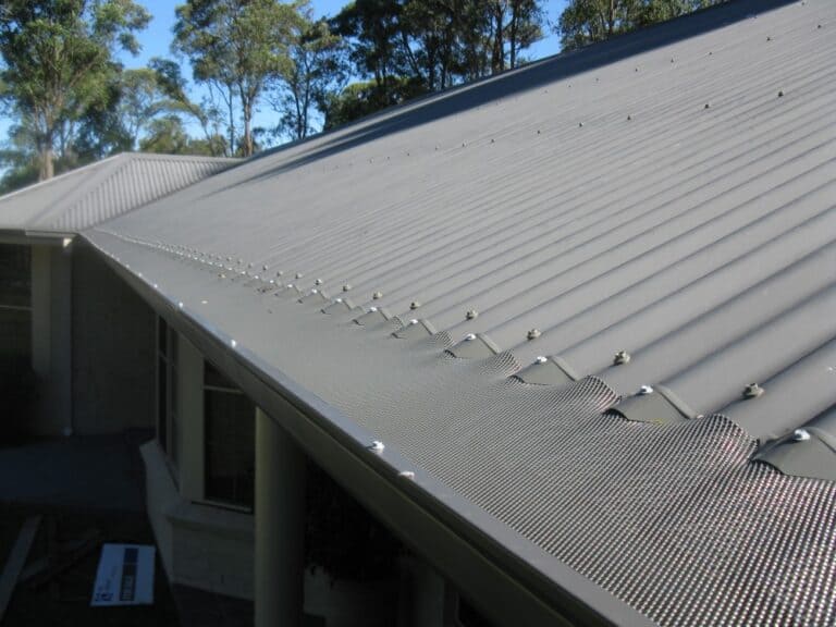 Karben Gutter Guard installation on metal roof after