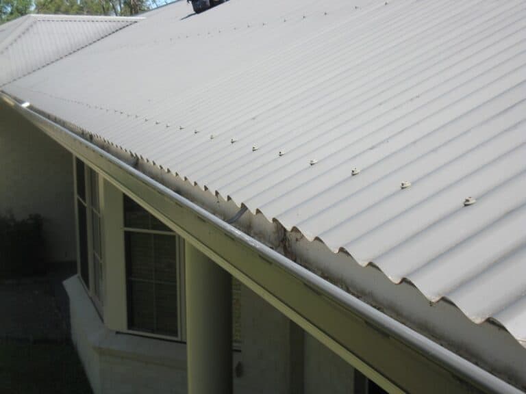 Karben Gutter Guard installation on metal roof before