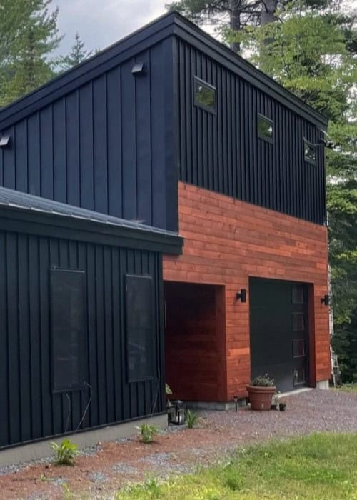 Exterior view of a modern farmhouse with Zeno-Clad™ board and batten cladding in Colorbond® finish